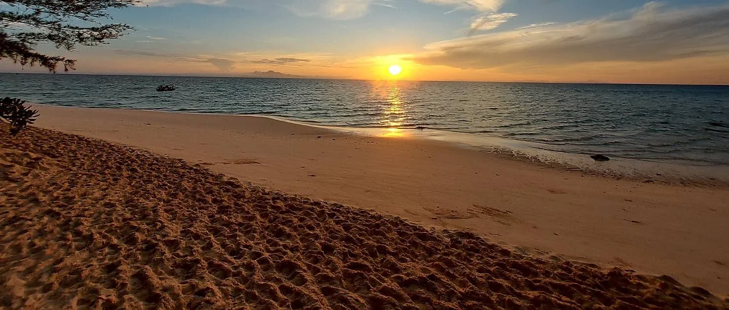 Catamaran sailing past Krabi islands at sunset on a 7 Islands tour with mini BBQ dinner
