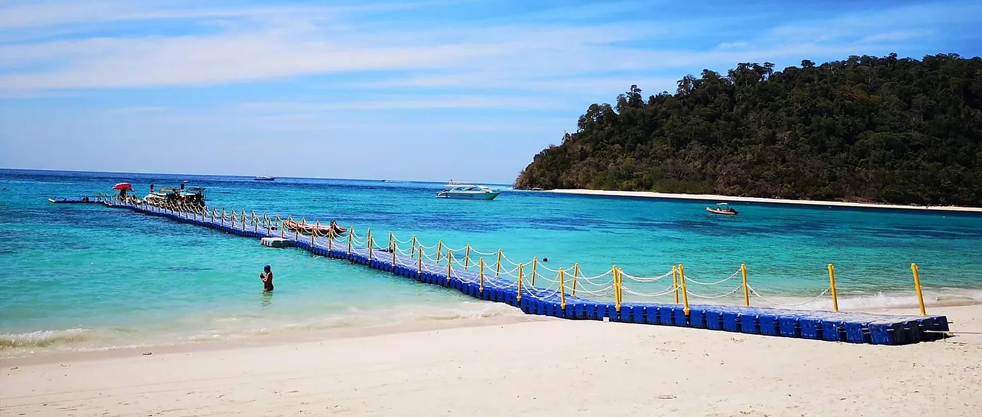 Crystal-clear turquoise waters and white sandy beach at Koh Rok, Lanta Island, Thailand