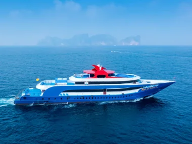 Ferry crossing from Phi Phi Island Ton Sai Pier to Phuket Rassada Pier on calm turquoise Andaman Sea