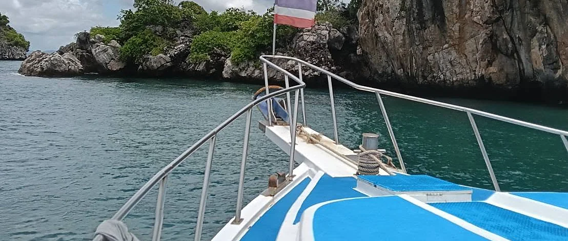 Scuba diving adventure in clear tropical waters off Racha Yai Island, Phuket