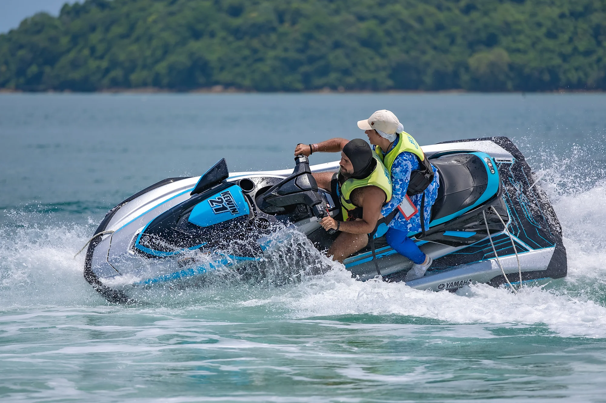 Riders explore Phuket's tropical coastline on Yamaha jet skis during a half-day island tour