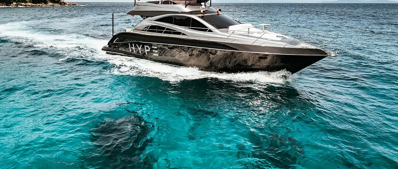 Private yacht cruising turquoise waters near Koh Hong Krabi and Phang Nga Bay on a full-day Phuket charter