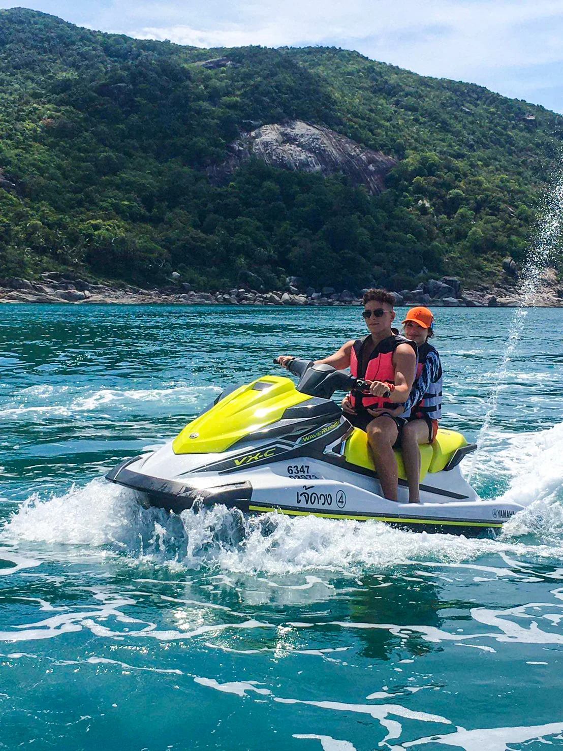 Jet ski riders speeding across turquoise waters on a five-hour safari around Samui Island