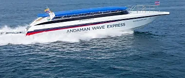Speed boat crossing turquoise Krabi waters from Ao Nang to Phuket on a sunny afternoon