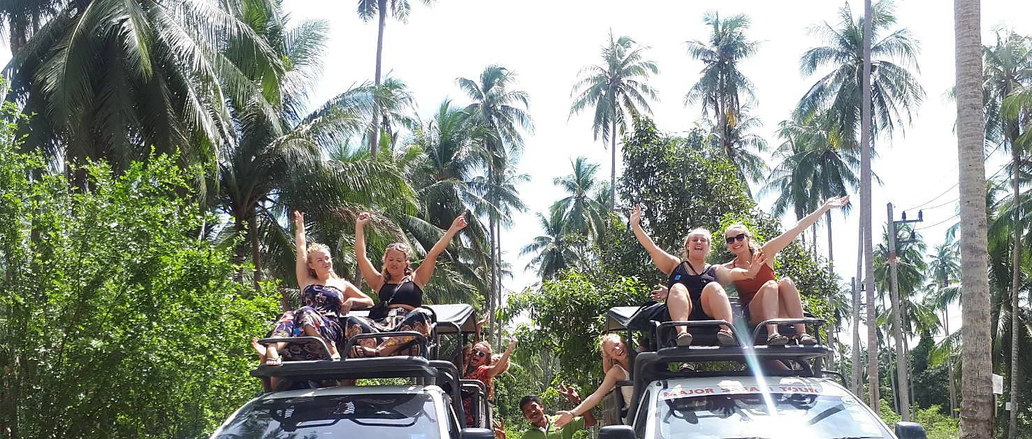 Open-top safari jeep exploring the lush jungle of Samui Island