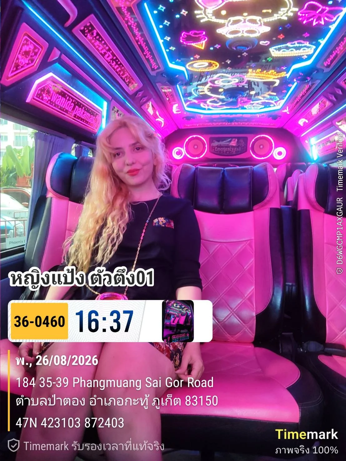 Guest seated inside a colorful neon-lit tour minibus in Patong, Phuket