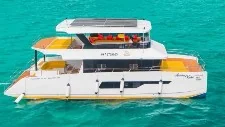 Catamaran cruising off Krabi on a 7 Islands sunset tour with a mini BBQ dinner